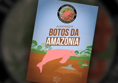 Capa do almanaque, com um boto-cor-de-rosa ilustrado nadando num rio amazônico